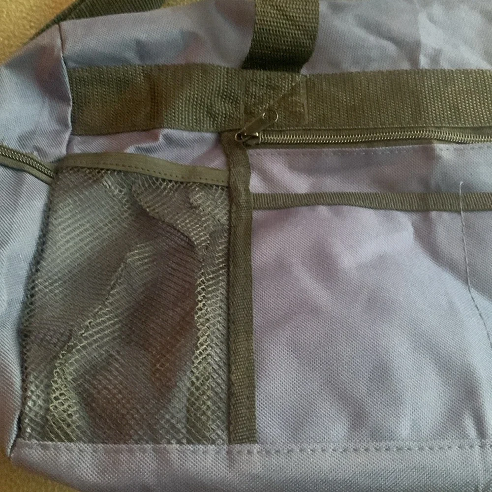 Smithsonian Air & Space blue and black duffel bag. Approx 17” x 9” x 7 1/4”